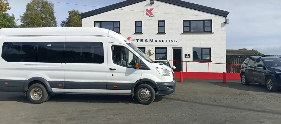 The Abel Travel minibus parked outside the K-Team Karting building in Kilrea